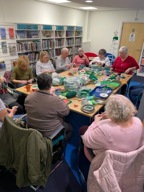 DenbsLibs's tweet photo. We are having a very industrious morning in #Prestatyn Library – wait till you see our Christmas tree!! 🎄#crochet #craftandchat #PlacestoConnect https://t.co/Y8lWPh4REg