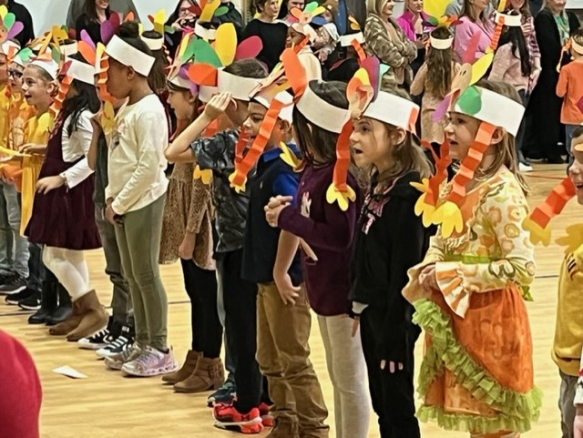 HurffvilleElem's tweet photo. Our First Grade classes hosted a "First Grade Thanksgiving" program for parents today. They sang songs, read poems, and told jokes that were all centered around tomorrow's guest of honor...the turkey! Thankful for our first grade huskies! https://t.co/t2Qc7MRHWt