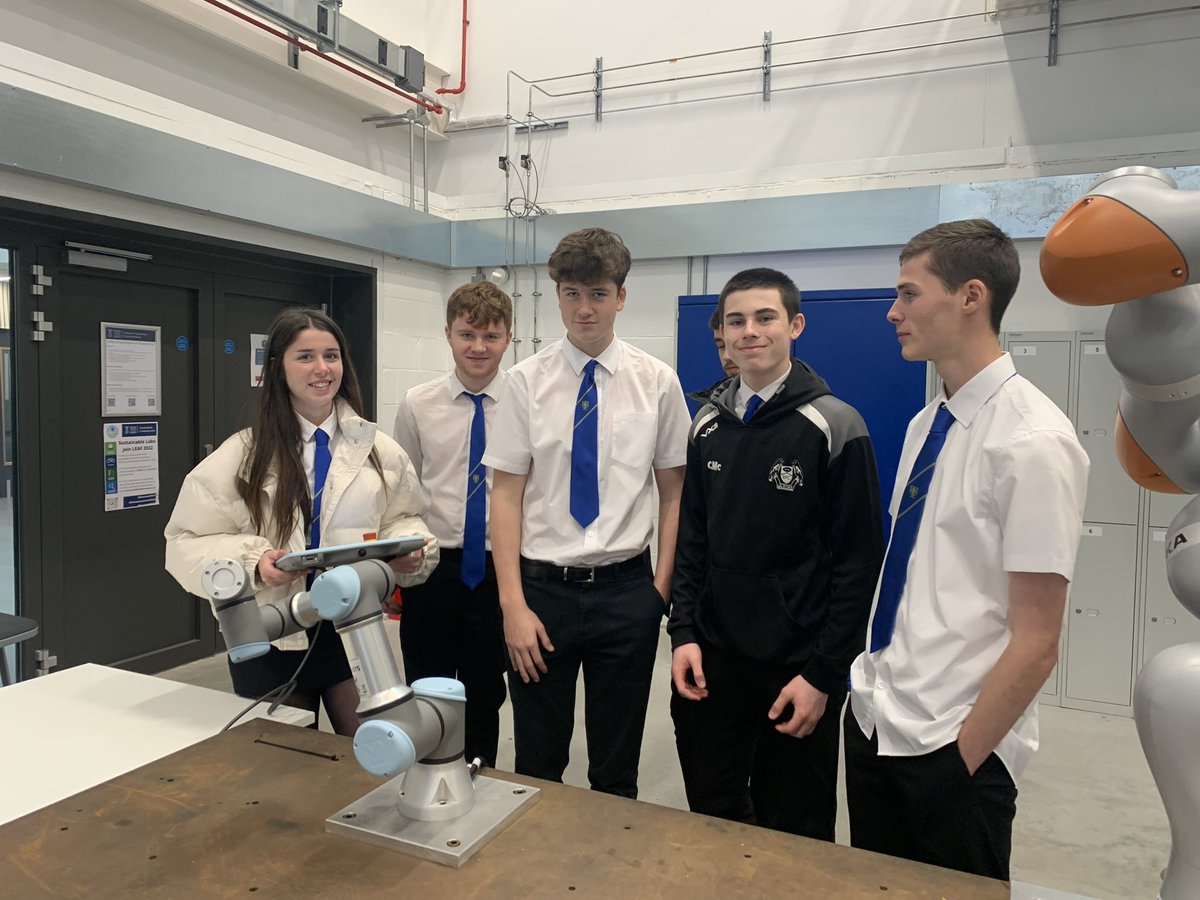 Year 12 trying out robotics at Swansea University to help with their Engineering Project.