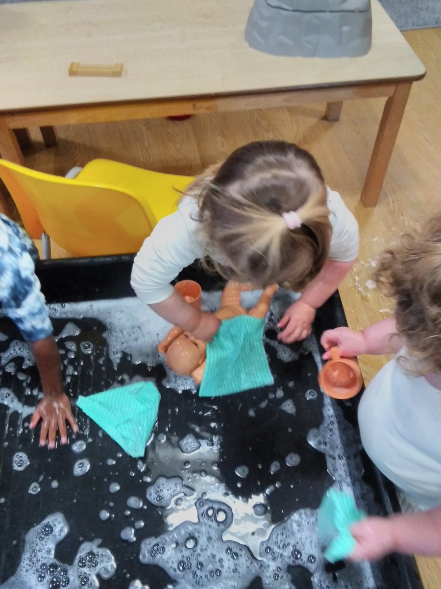 Our focus this week has been water. #watervoles have been washing the babies! They have used their pouring skills to help the babies become clean. We talked about the importance of washing. 'I'm washing baby's legs'. #waterplay #eyfs #ndna