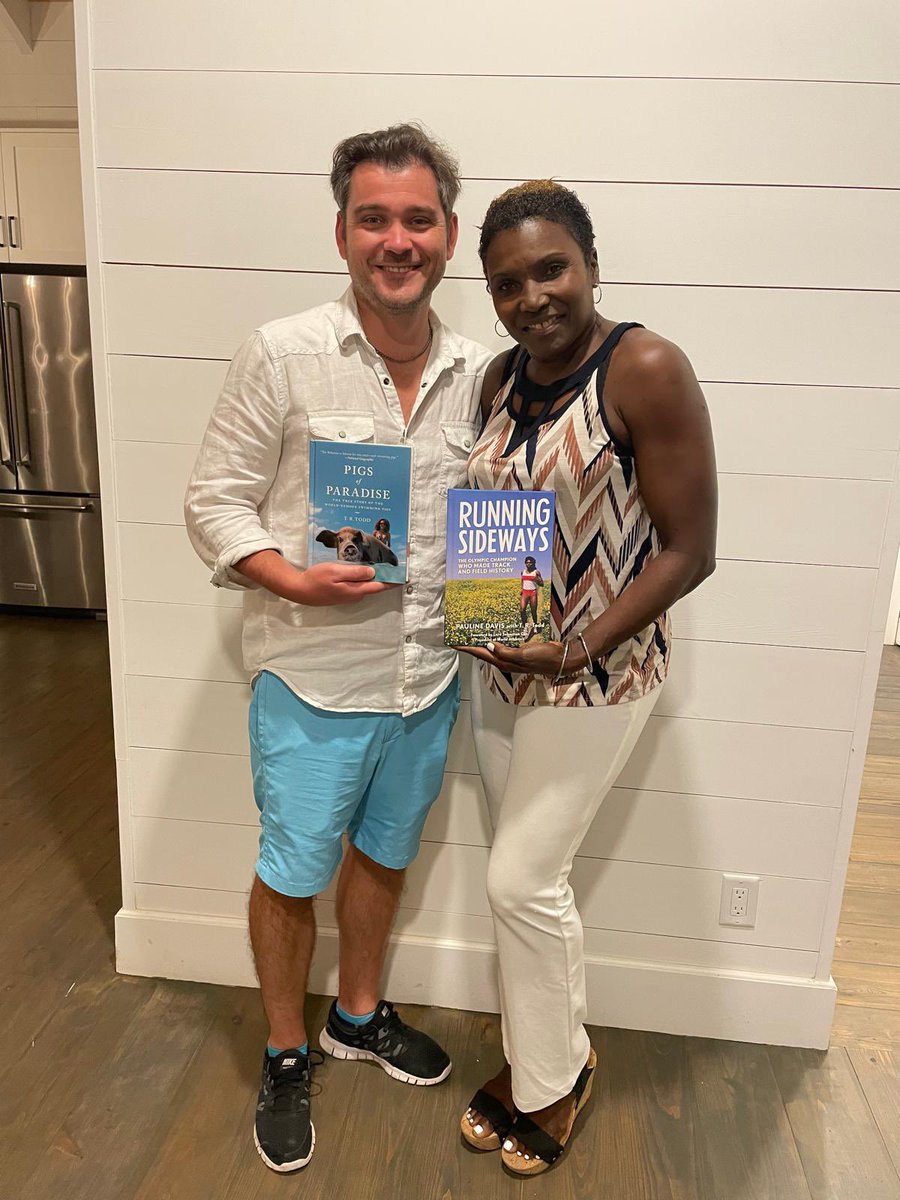 PaulineDavisBAH's tweet photo. With my ghost writer during a recent trip to #Exuma. We met @Run4Pompey eight years ago and have been good friends ever since. Pictured here with my book and @ByTRTodd previous book @PigsofParadise #WritingCommunity https://t.co/DJskxGWmOh