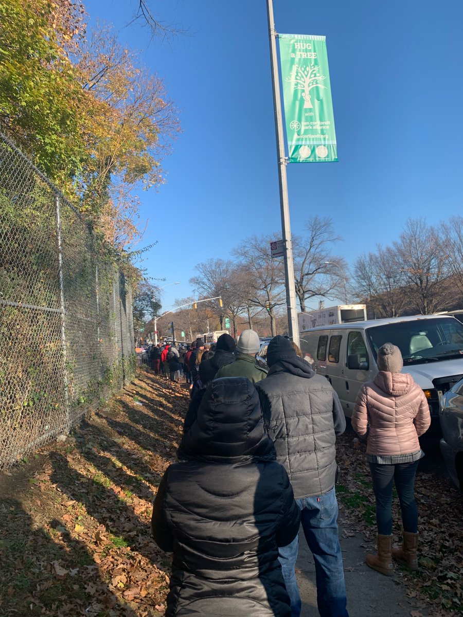 localmujer's tweet photo. My partner is live in front of Llyod's Carrot Cake in the Bronx. Firefighters drove up with sirens on and walked out with two cakes. 

A chorus of people yelled, "you cut the line!" Firefighters were seen smiling as they drove away. https://t.co/doT015TLaj