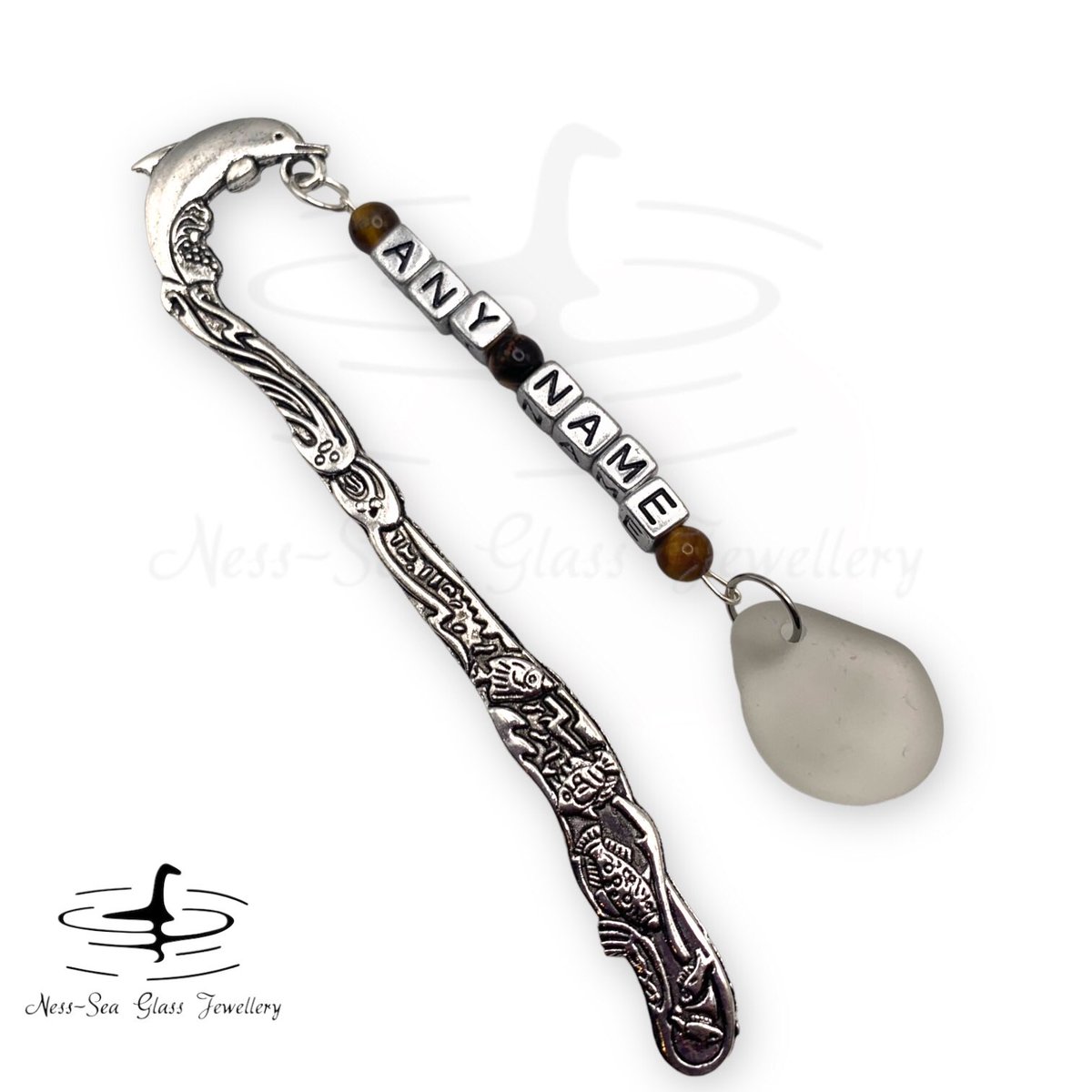 Ness_SeaGlass's tweet photo. My most viewed products this week have overwhelmingly been my Loch Ness Sea Glass Bookmark. All varieties have been popular with the personalised name choice just edging out on top. 
Perfect Christmas present ideas 
https://t.co/GDWaOArE1p
#MHHSBD #HandmadeHour https://t.co/HZdkPQ9RJ4