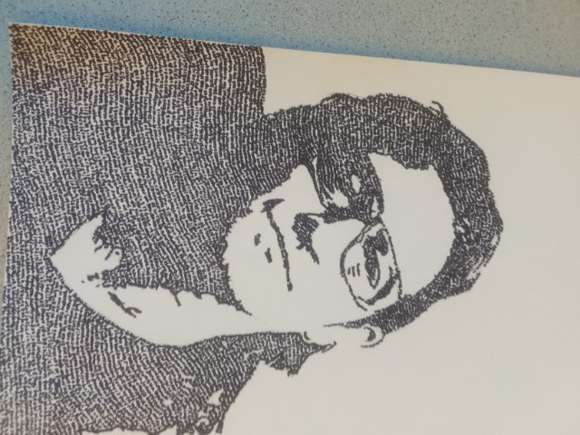 EricFerguson's tweet image. My 13 yr old son had an assignment to sketch &amp;amp;shade a picture of someone.  Since he's a big fan, he chose Bono from U2.  Here is his pic..but he chose to not make any lines drawings or shading... everything in the pic is handwritten lyrics of U2 songs! #u2 #bono @OfficialBono