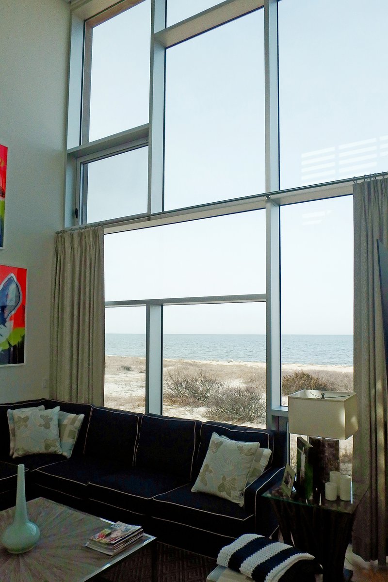 TOTAL COHESIVENESS. The designers of this ultra-modern home in Long Island, NY demanded consistency in the fenestration needs throughout the entire structure – something only a single-source supplier could provide. Contact a sales representative to learn more.