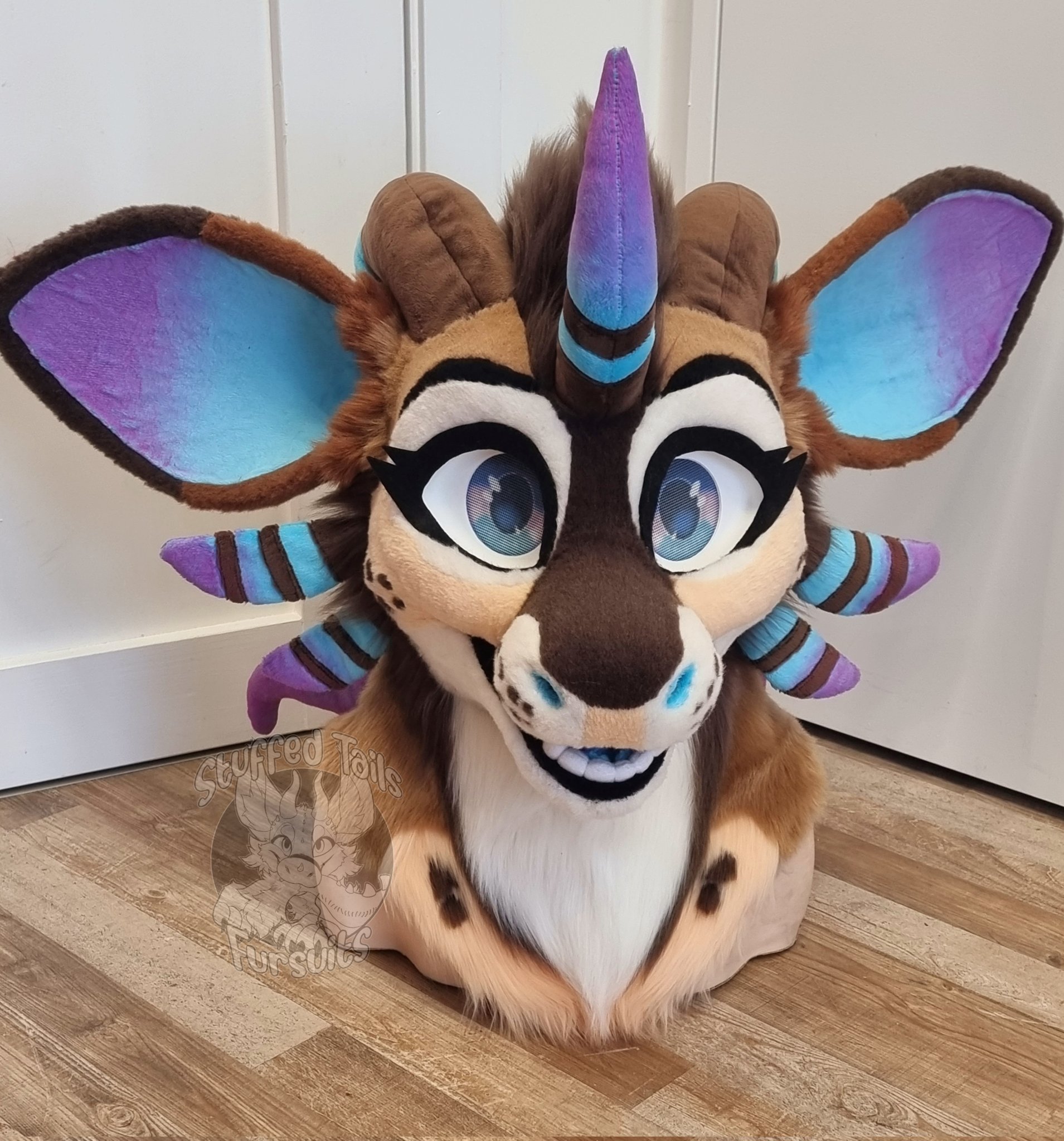 StuffedTailsFursuits |STF| on X: 💙Ephiny💜 Head commission for  @MAMBODREKKIE ! It was very fun making this cutie! She is my very first  fluffy dragon using my new fluffy dragon base! Also I