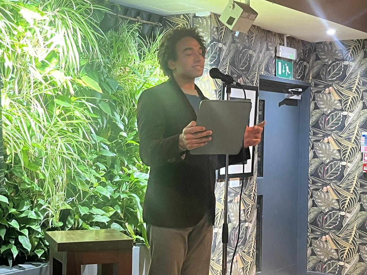 Booktrust's tweet photo. The brilliant Waterstones #ChildrensLaureate @JosephACoelho is here to talk about his own experiences. 

He shares a memory of working on an awards longlist - that had no men of colour on it, and the stress response it caused, as a reminder of the feeling he might not belong. https://t.co/safGMlfYi4