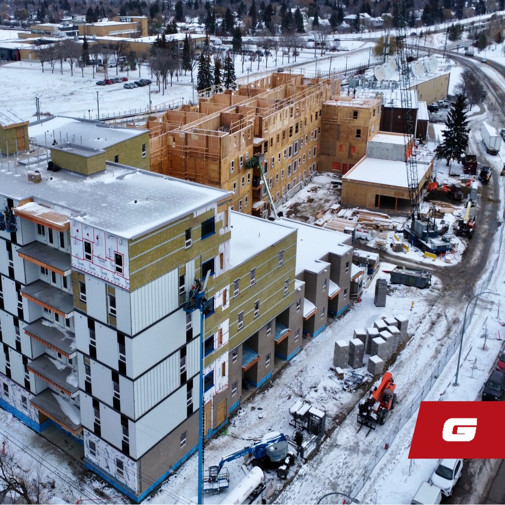 GrahamBuilds's tweet photo. Our team is working hard on the Lendrum housing complex in #YEG. 
The entire six-story superstructure of the west building is complete, with exterior envelope, metal cladding and brick veneer siding systems more than half complete. #GrahamBuilds #Buildings #Housing https://t.co/Ccy4tlmLsw