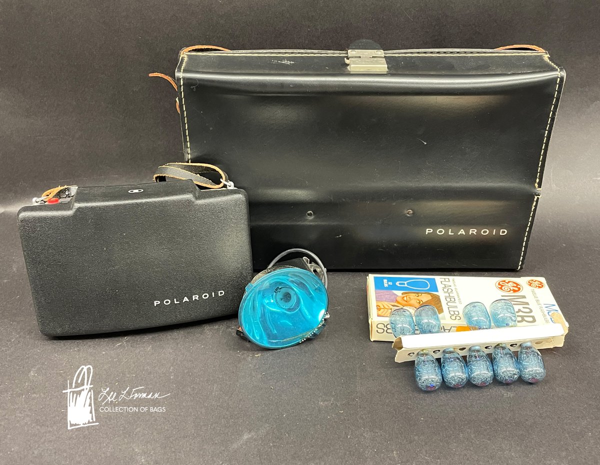 332/365: This Polaroid carrying case from the Lee L. Forman Collection of Bags still contains the camera it was designed to hold along with different sizes of flash bulbs. The company dates to 1937 and was founded by Edwin H. Land.