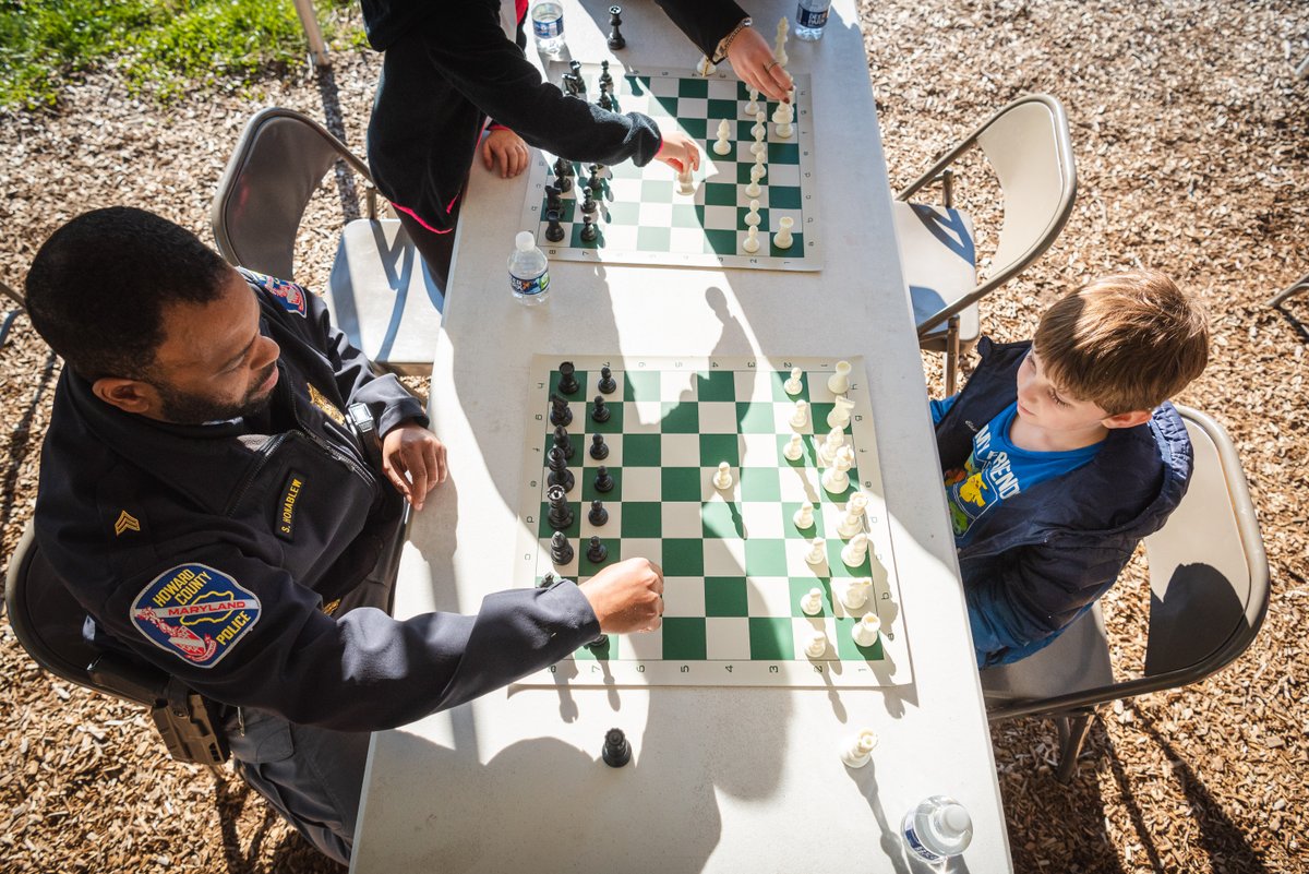 Our community outreach officers and department chess aficionados joined <a href="/hcpss_loes/">Longfellow ES</a> students and staff for Community Chess Day on Tuesday! Special shout-outs to Sgt. Bendu and PFC Vo who organized the event and have been teaching chess to various youth organizations for years.