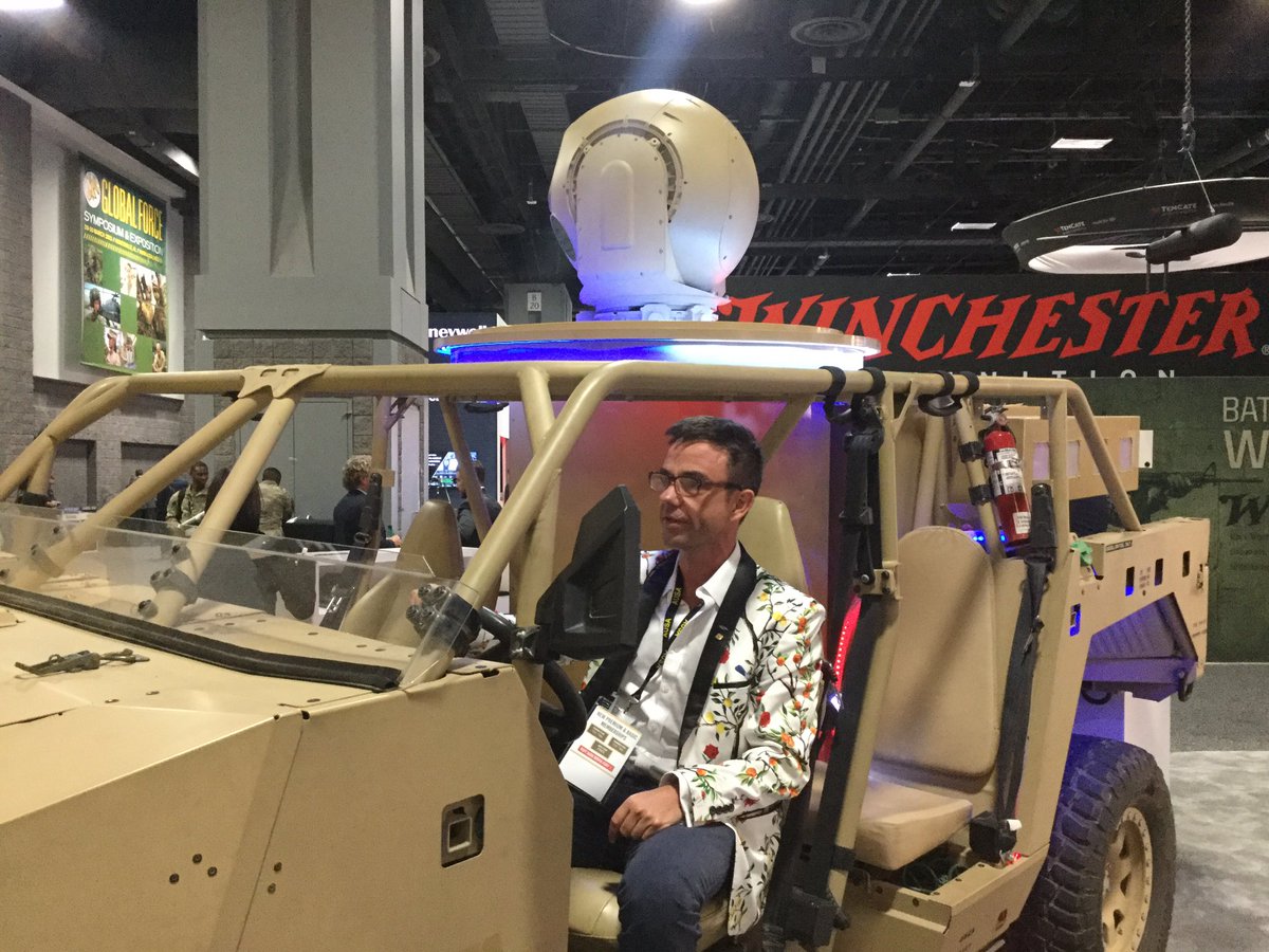 HuntClancy's tweet image. I asked the Raytheon bro’s what the anti drone laser mounted on this dune buggy would do if you shot it at a dude, and they said it’d punch a cauterized hole through them and then I asked how they knew that for sure and they kinda looked side to side and pretended to not hear me
