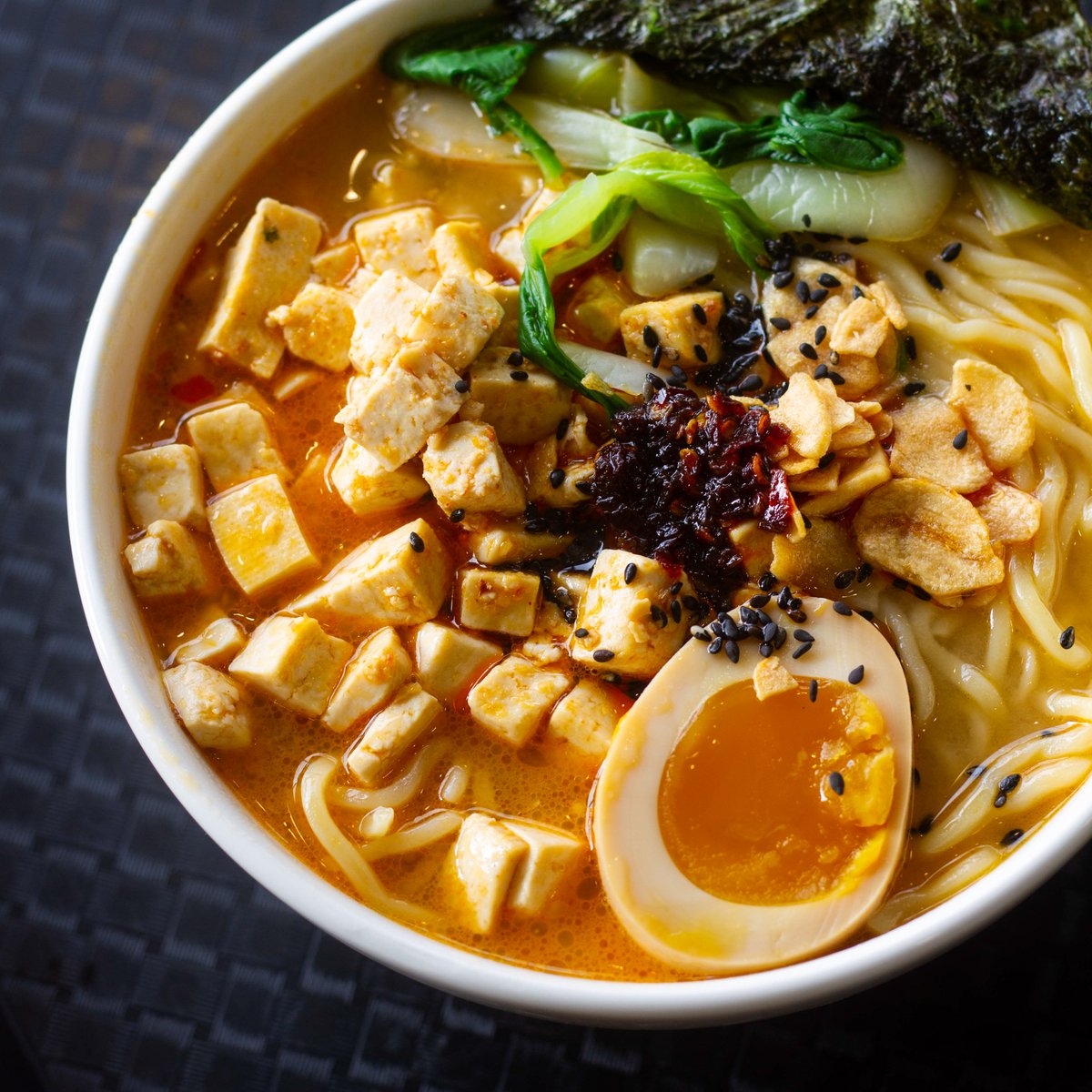 HospitalityUofG's tweet photo. #POV: You grabbed a bowl of Spicy Tofu Ramen from our ramen pop-up in the UC Chef's Hall. 

The pop-up runs from Monday to Thursday, from 11 am until 3 pm (or until sold out).

The pop-up is located in the poutine station (next to the KFC).

#UofGCampusFood
#ForwardFood https://t.co/KeVKZKXgYO