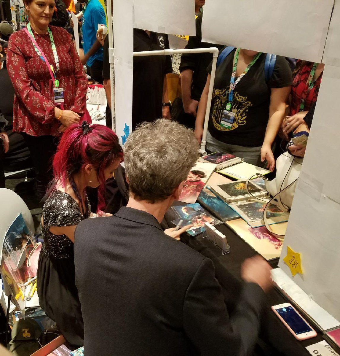 alicexz's tweet photo. 2017 was a hard year for me. I barely made it to NYCC—had been hospitalized for severe depression, was crying all the time, etc. So when Peter Capaldi surprised me at my table it felt like the real Doctor had somehow heard me, and cared… I’ll truly never forget it. #DoctorWhoDay https://t.co/d6Ut5ObgI5