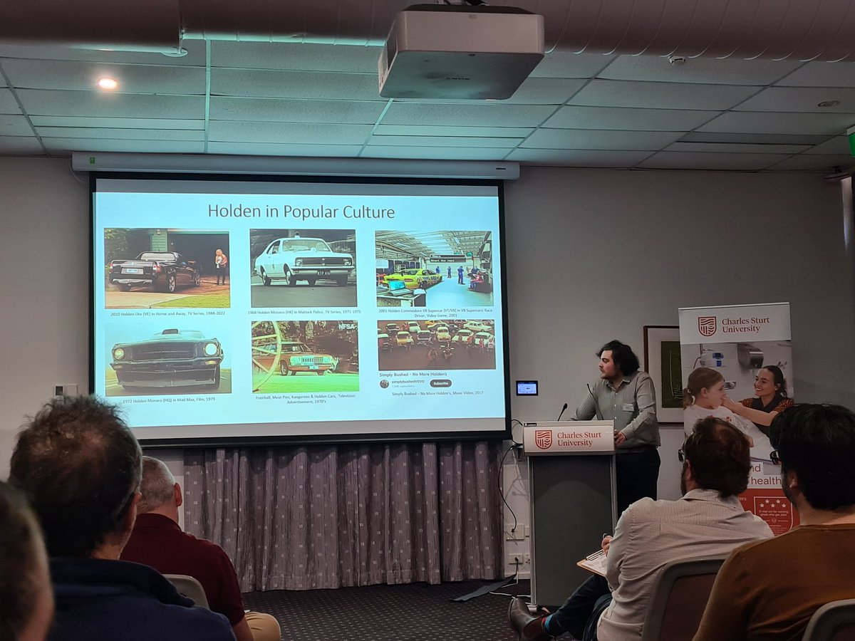 SandraSavocch's tweet photo. Grear presentation Jordan presenting his research on sports fandom and the significance of Holden in Australia at 2022 Faculty HDR &amp; Honours Symposium @CharlesSturtUni #FOSHSymposium #honoursresearch #graduateresearch #phdlife https://t.co/3ZsNdjI8Zz