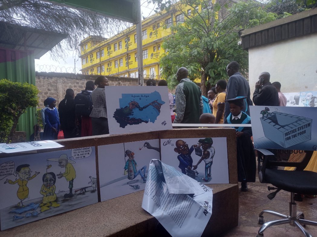 VinetteWandera's tweet photo. Mathare community gets a chance to learn more about  justice through cartoon exhibitions as a build up activity for 16 days of activism against G. B. v https://t.co/01qbW9wS3i
