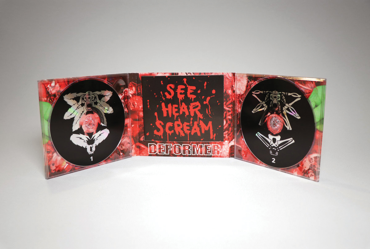 The CD packaging for Deformer's 'See Hear Scream' album