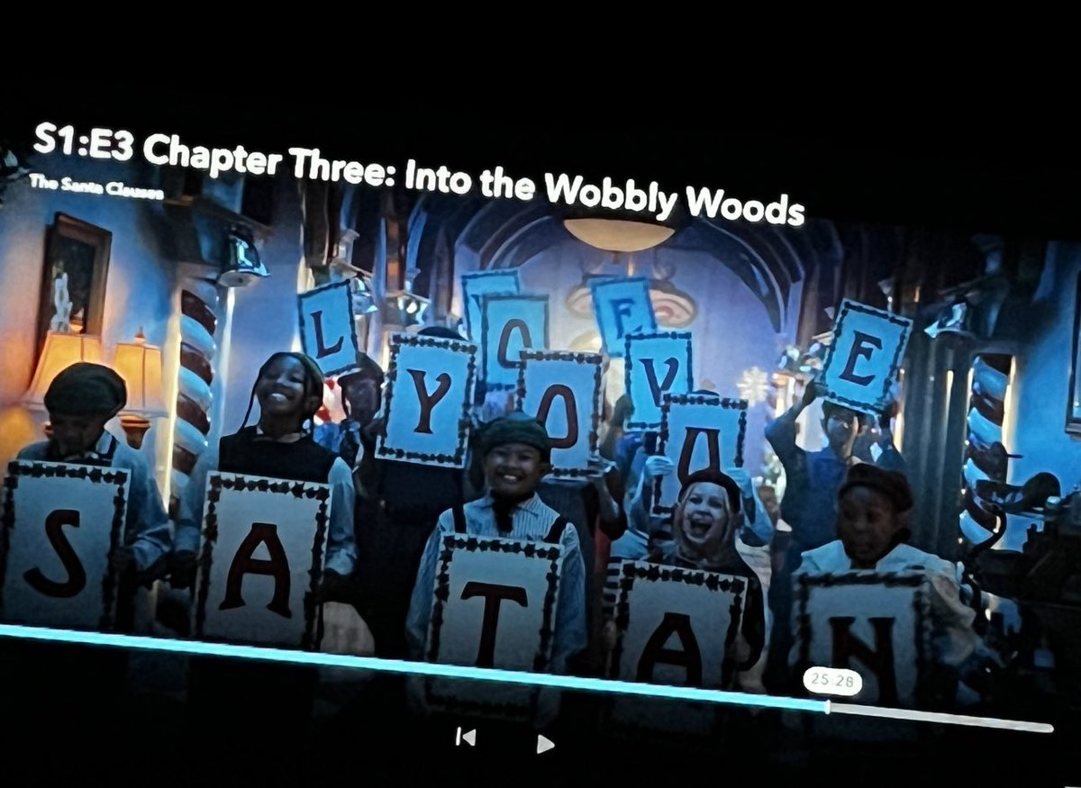 Enchryptian's tweet photo. @elonmusk @ramzpaul @Disney @DisneyPlus should be ashamed of themselves. Wtf is this.. don’t believe me go watch the new episode of #thesantaclauses for anyone wondering this is a bunch of kids holding up signs that read “we love you satan” https://t.co/DPBtM7igZx