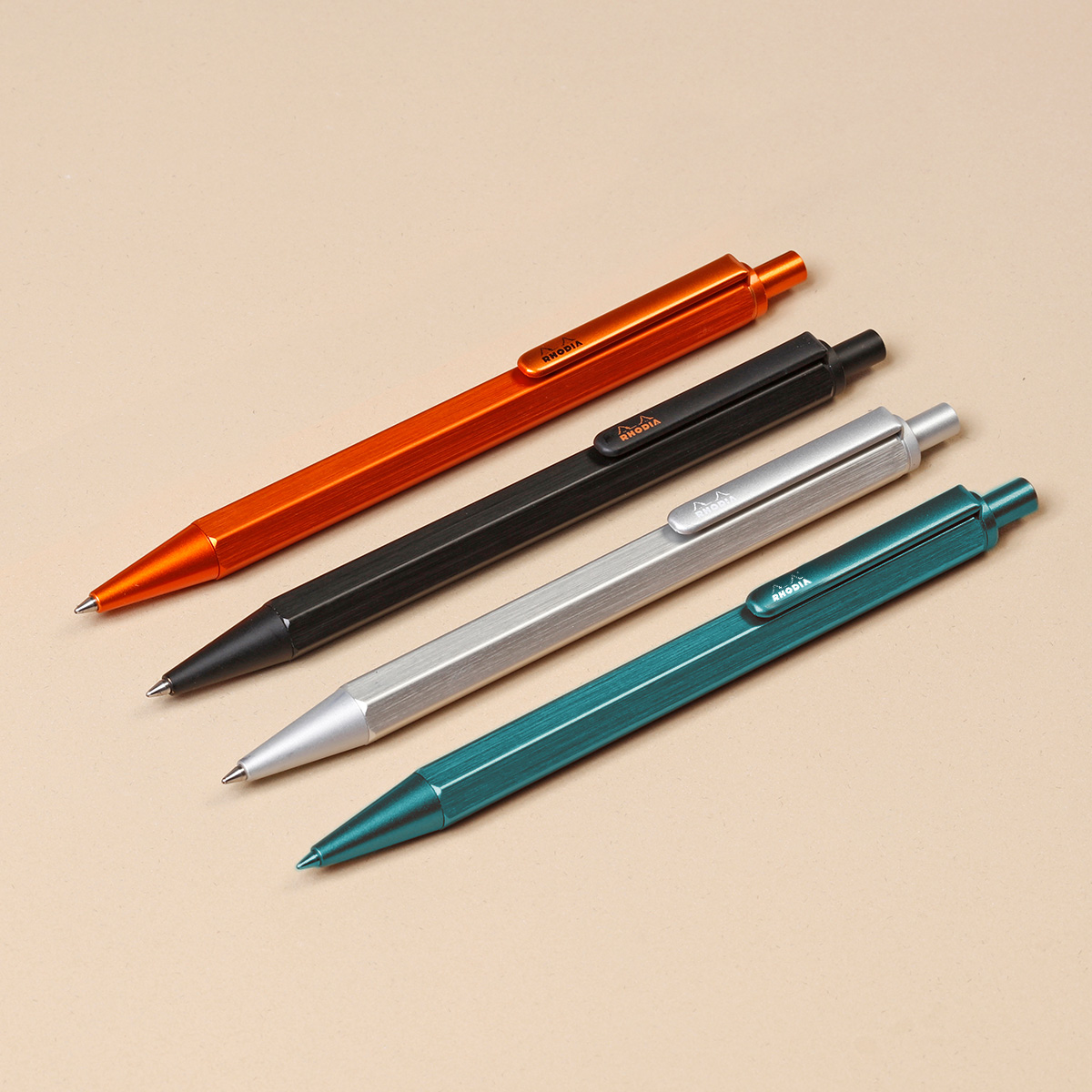 The Rhodia Ballpoint Pens are available in a range of colours to complement Rhodia notepads. 

Brushed aluminium hexagonal barrel with a push-button retract mechanism  with a pocket clip engraved with the iconic Rhodia logo. 

Available from <a href="/cultpens/">Cult Pens</a> -&gt; cultpens.com/i/q/RH55542/rh…