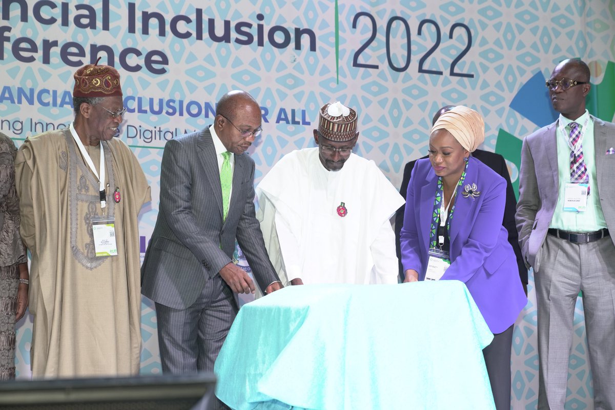 L-R Minister of Information, Mr. Lai Mohammed, CBN Governor, Mr. Godwin Emefiele; Representative of President Muhammadu Buhari, FCT Minister, Mr. Mohammed Musa Bello, CBN Deputy Governor; Financial System Stability; Mrs. Aishah Ahmad.