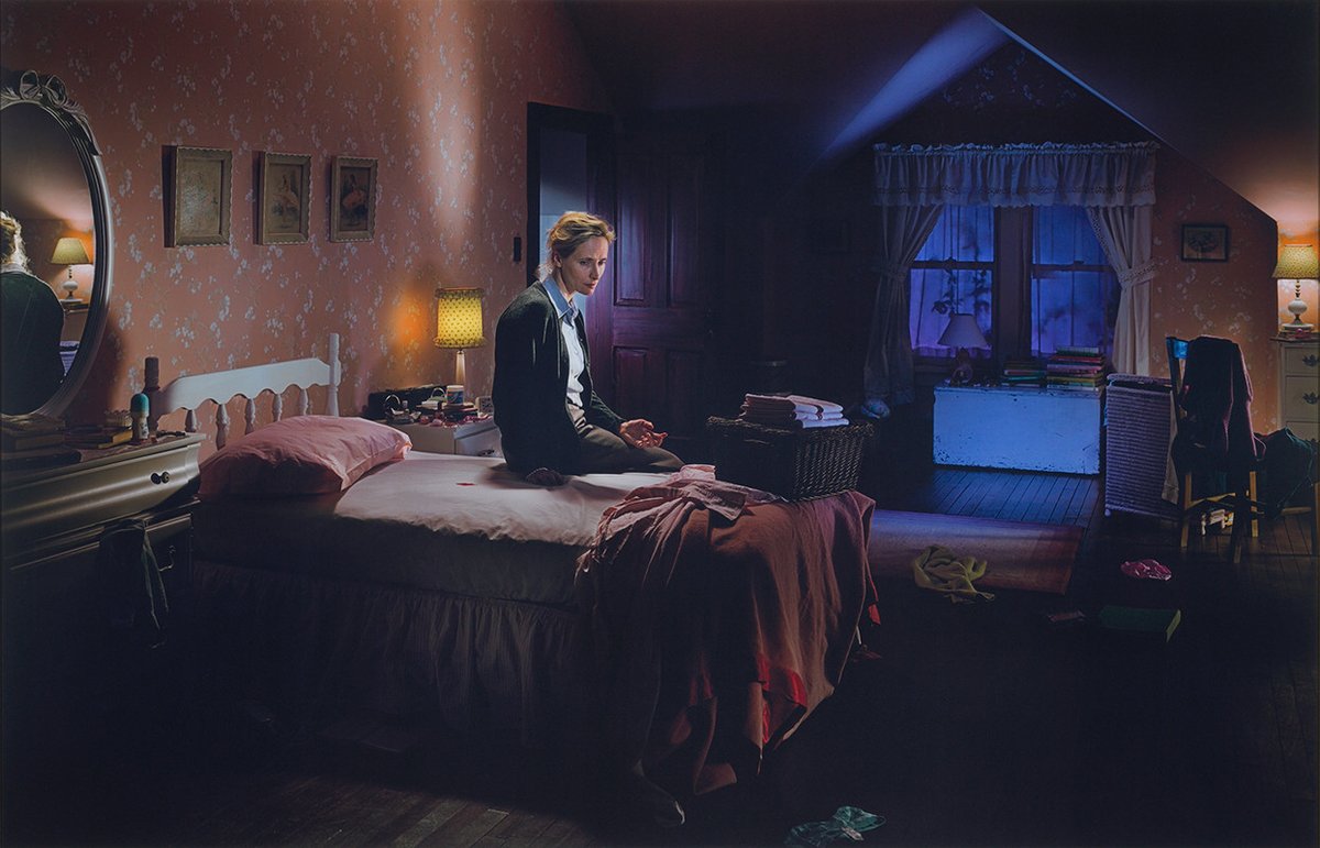 AestheticaMag's tweet photo. #CollectionHighlights The Essl Collection | @crewdsonstudio, 'Untitled', (2004)
A woman sits on an unmade bed in a shadowy room, lost in thought. The photograph explores themes of identity, acceptance and memory. https://t.co/rYTU1XrccK