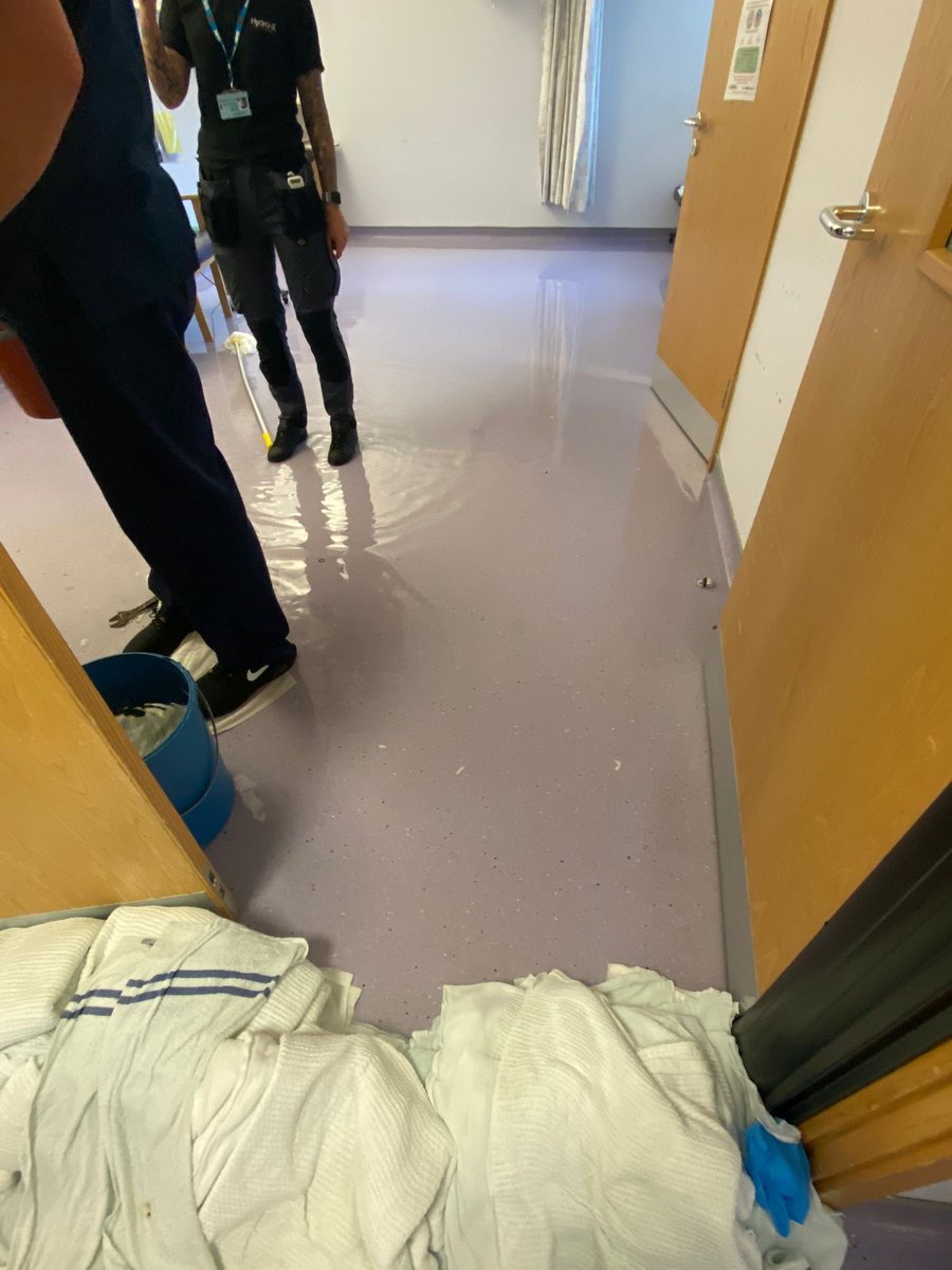 AndrewHaydonRN's tweet photo. A surprising water leak on the ward today! #teamadelaide came together as always moving patients, building dams and catching water! I think the resourceful of @RBNHSFT CARE values was definitely ticked! Thankfully now back to normal! #teamwork https://t.co/gSXYyBA3us