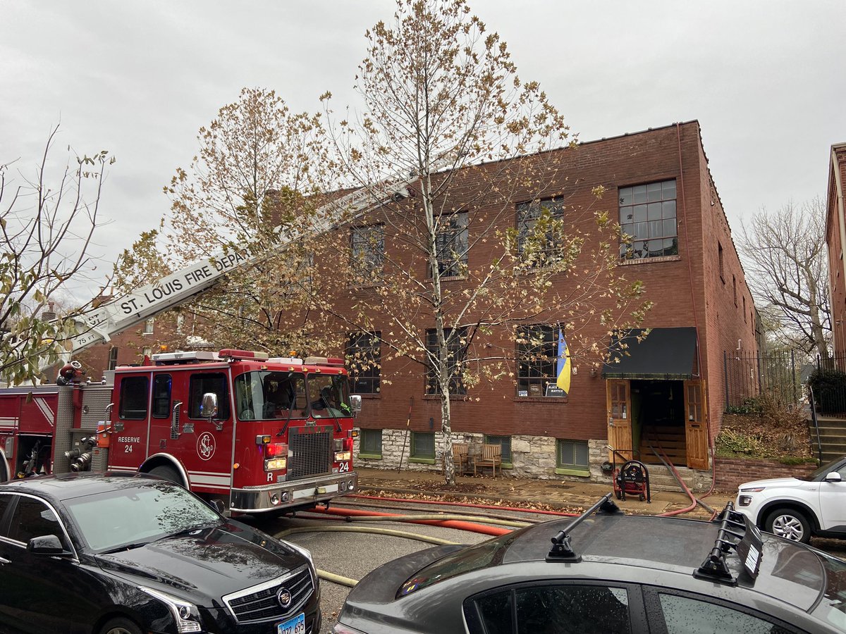 STLFireDept's tweet photo. Battalion 2 reports: Large two story brick, mixed occupancy commercial building. Heavy #fire in an elevator shaft extending to/through the roof. Multiple hand lines working. Main body of fire knocked down. Extensive overhaul ongoing.

A second alarm requested. #STLCity https://t.co/epsfK0bAmC