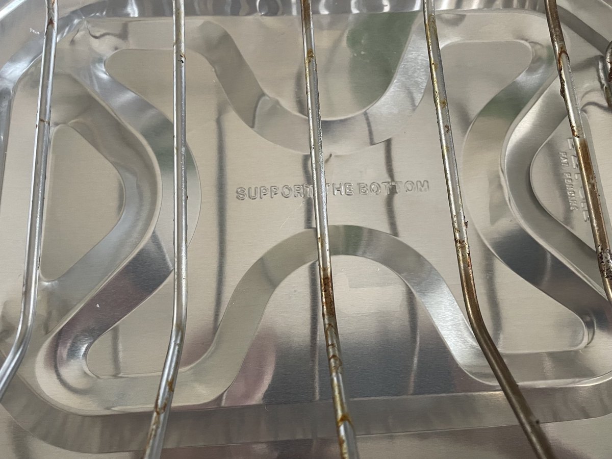 EkdahlPress's tweet photo. My brain has been so throughly corrupted by nonstop stupid political sloganeering, that I initially thought this roaster pan was preaching at me. #SupportTheBottom https://t.co/RQoEVBosgp