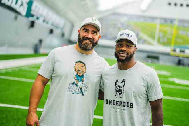 thephilacitizen's tweet photo. Thank you, @JasonKelce for all the reasons @Eagles fans love you, but also because you believe in the power of #education to make #Philly, your #hometown and ours, a better place. (Love the new t-shirts too.) #HungryDog #FastDog #Underdog @UnderdogApparel https://t.co/XzX8Zb6SnW https://t.co/WsXAT22nMY