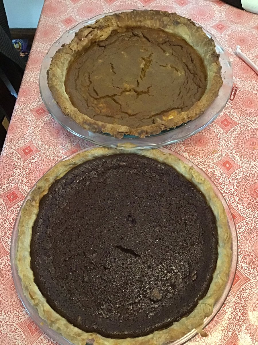 hennasarai's tweet photo. Pies.  Forgive the bad lighting, its 2:15pm, and the sun has already set.  Buttermilk chocolate and pumpkin with all-butter crusts. https://t.co/J0b8WRWfuA