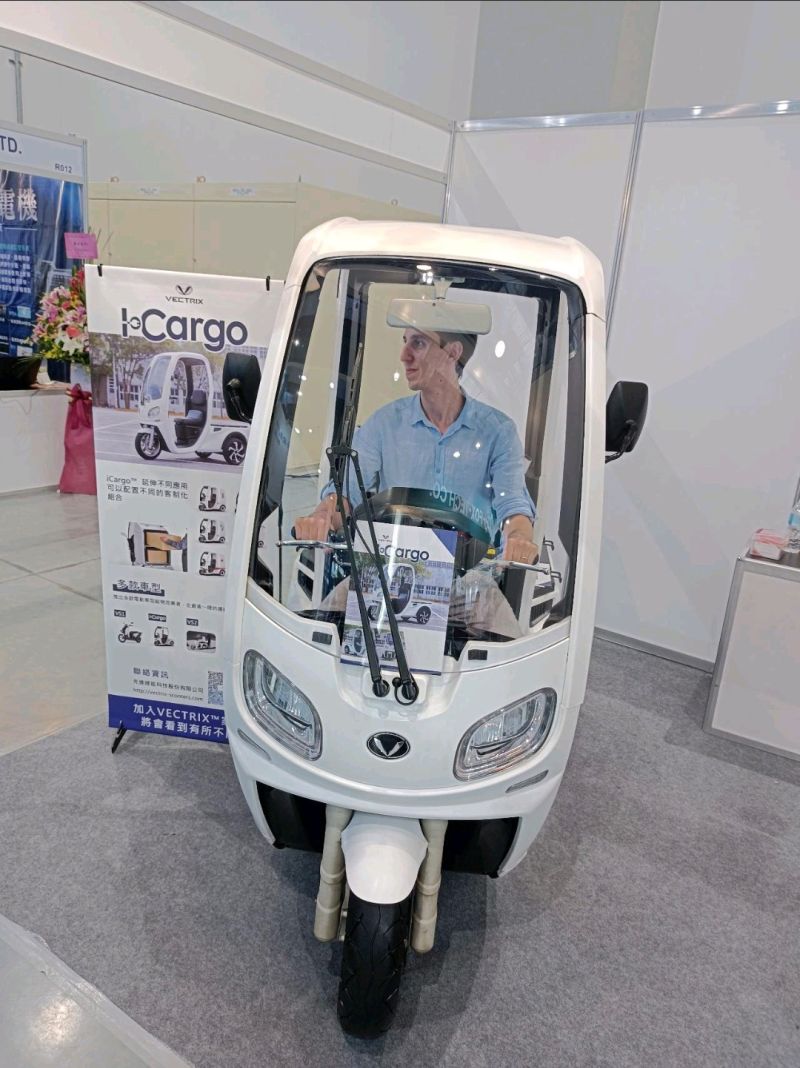 Cabletree1's tweet photo. Cabletree have been working with our customer on their #electric scooters.  We were thrilled to see the three-wheeled E-scooter at the trade show; our sales Sergey jumped on the E-bandwagon to support the ESG activities in #Taiwan.  
#wireharness #cableassembly #ESG https://t.co/tHn0DVN5MH