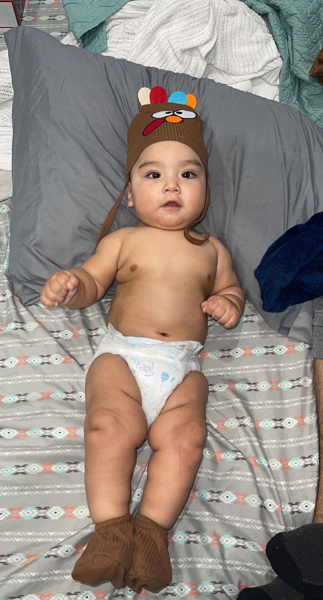 SueHappy3's tweet photo. Happy first Thanksgiving to my Chunky!  😩😭 #teamnoclothes #turkey #baby a little sick but always happy https://t.co/PvJfe5dtQ1