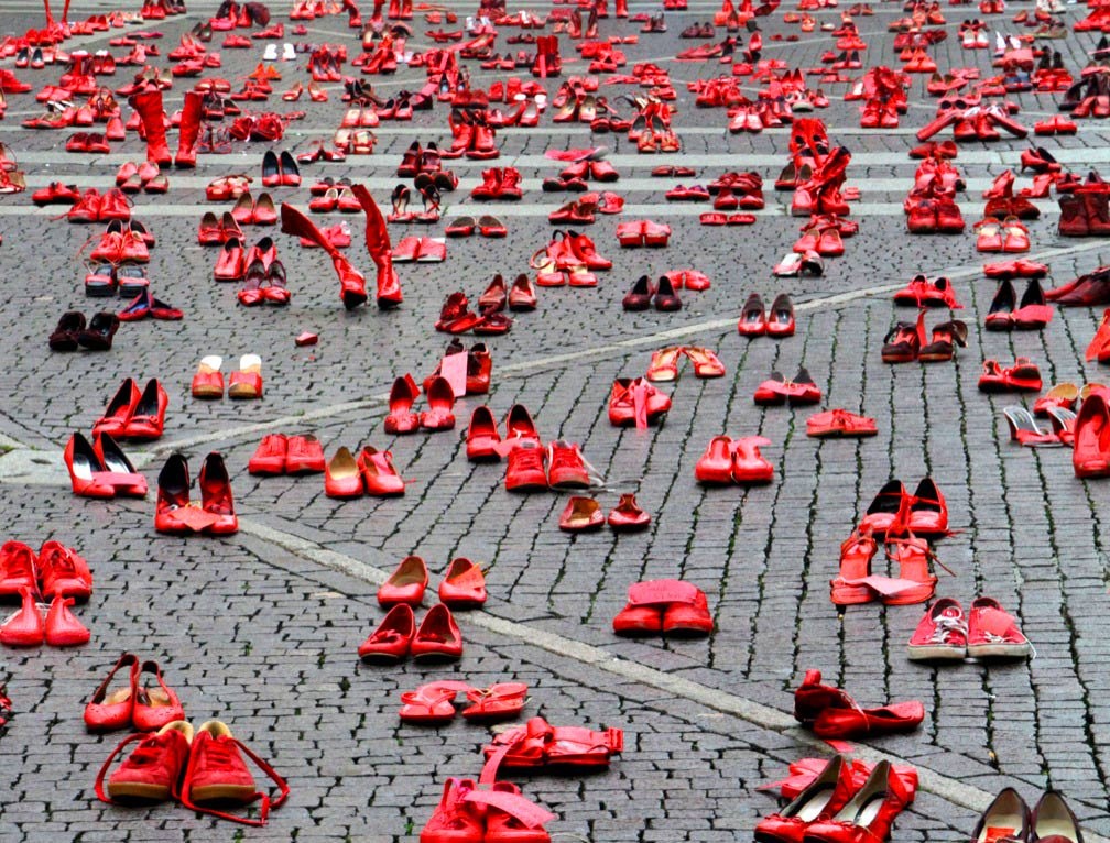 Red Shoes (2009) by Mexican artist Elina Chauvet, installation on male violence and number of missing women and girls to femicide -murder of females #WomensArt