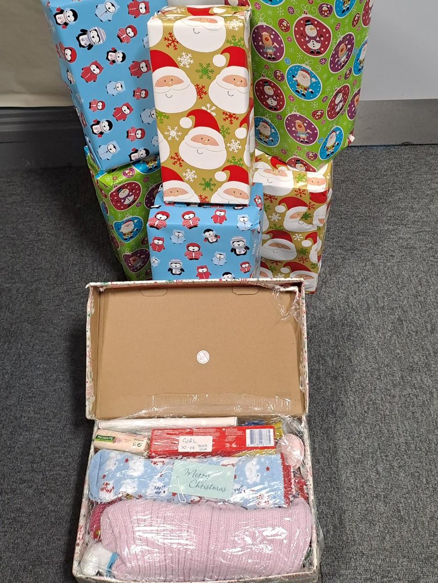 RushcliffeS's tweet photo. Sixth form students are doing a great job wrapping shoeboxes and collecting items for @sewadaynotts  Christmas appeal. Thank you to all who have dropped shoeboxes, items and even a packed shoebox! Please continue to drop any donations at the school's reception. Thank you! https://t.co/nBxGGbNjsR