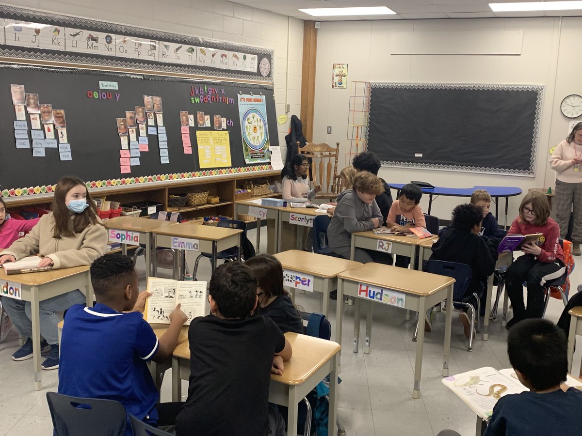 StPiusXLondon's tweet photo. Ms. Hoornick’s and Ms Sommers’ classes buddying up to read https://t.co/Adr4RaBTC9