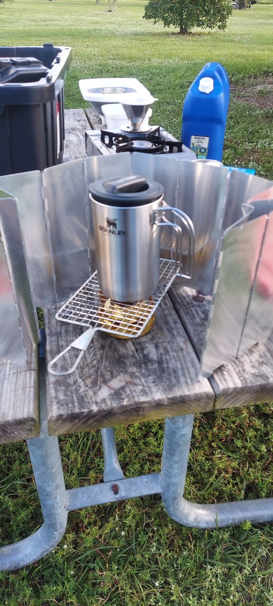 NoirPrepper's tweet photo. Trying out an alcohol stove I recently bought. Had to use a grate to accommodate the coffee press (will have to modify something for a tighter fit) but it did the job. 
Always practice your preps before you have to use them.
#Prepper 
#alcoholstoves
#practiceyourpreps 
#camplife https://t.co/OLXp7Zlsuj