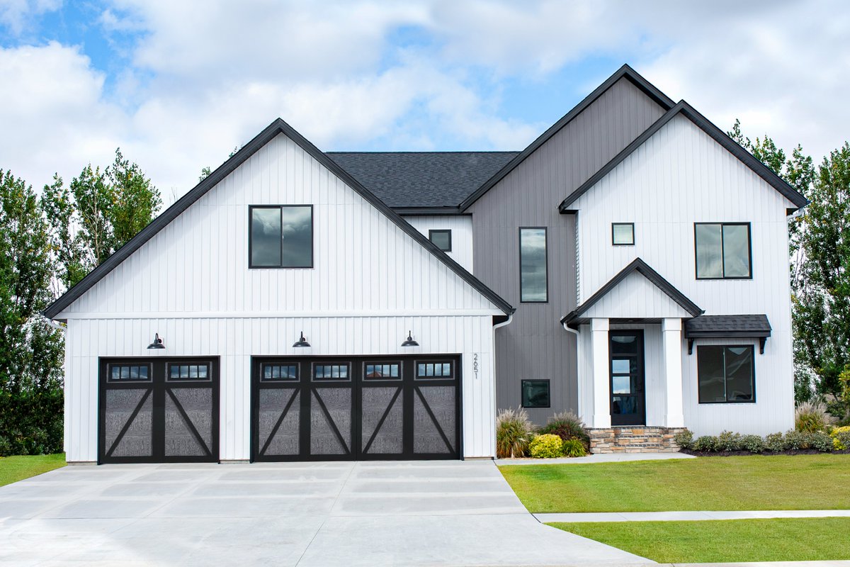 Try something new with our woodgrains! Adding overlay boards to your garage door enhances the charm and elegance of your home. Pick the style that best fits your home! bit.ly/3VMG0Bf
