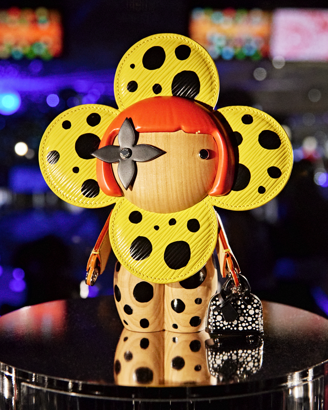 Louis Vuitton on X: Double strike. Celebrating #LVxYayoiKusama in Tokyo, # LouisVuitton's Mascot Vivienne transforms into #YayoiKusama herself,  dressed in the artist's iconic infinity dots. See more and countdown to the  collection, revealed