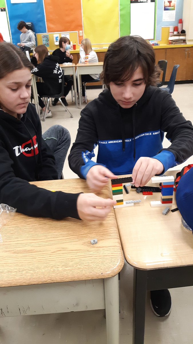 debdol13's tweet photo. The task: Using all the Lego in your bag, build a device that has an arm that can swing and hit a marble the farthest. https://t.co/hUYfF1Gpky