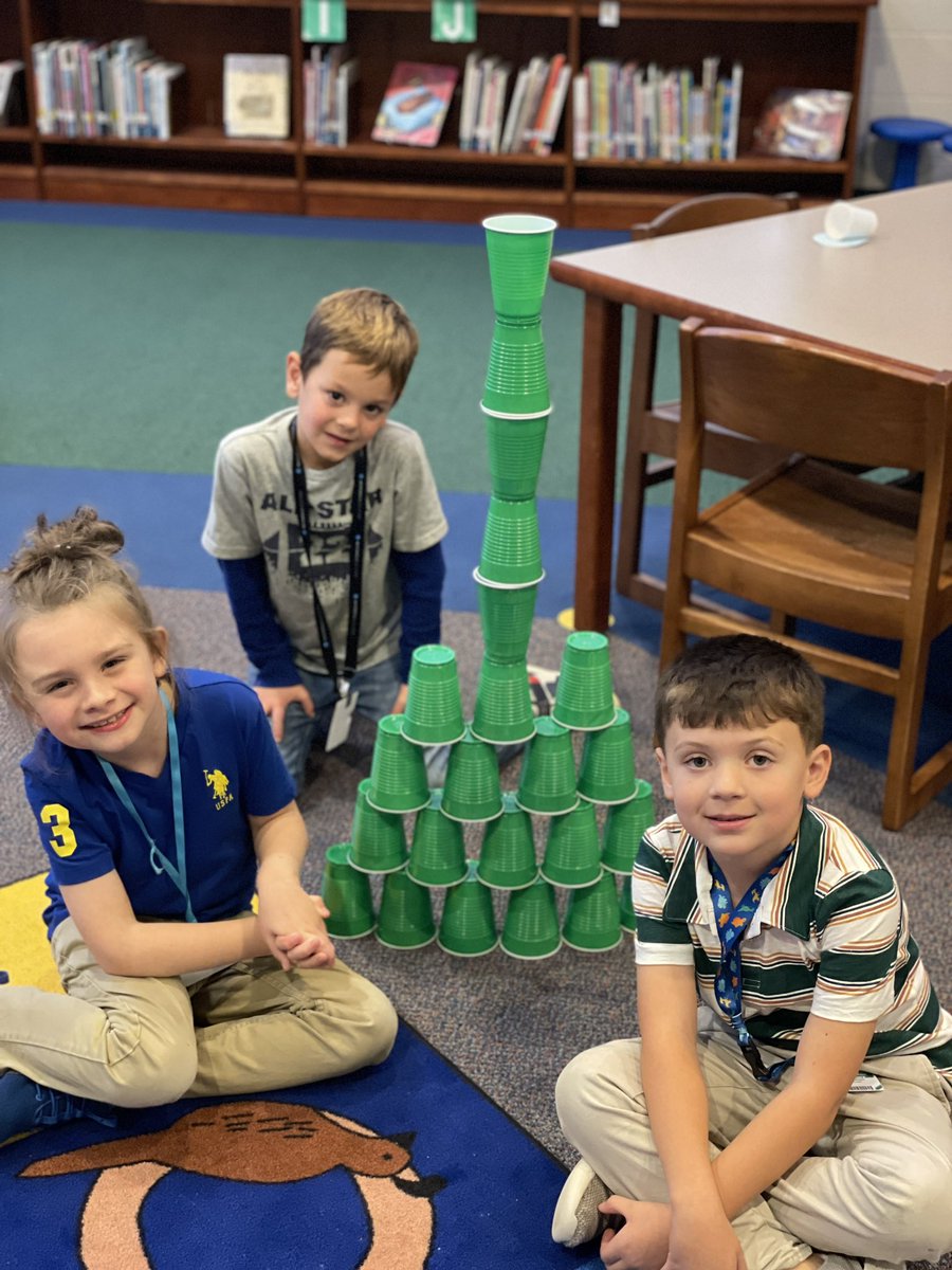 PrimarilyMedia's tweet photo. Today in Media students listened to “A Wish to be a Christmas Tree” and then tried to build the tallest Christmas tree. We had a great time! #OdellPrimaryPride #ElevateCabarrus #LibraryTwitter #StorybookSTEM #STEM #STEMbin #Collaboration #cooperation https://t.co/DR3AL5f5OA