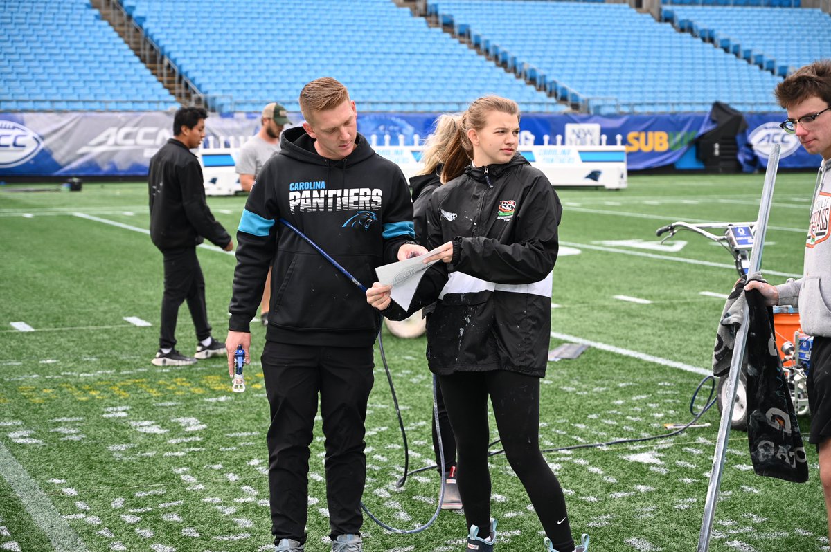 TurfgrassTiger's tweet photo. Truly one of the most incredible moments in our program’s history. Our students were tasked with working alongside the @Panthers grounds crew, prepping the field for the ACC Championship. Thank you, @TifDan14, for bringing the next generation to the professional on stage. https://t.co/KBPBLqErQb