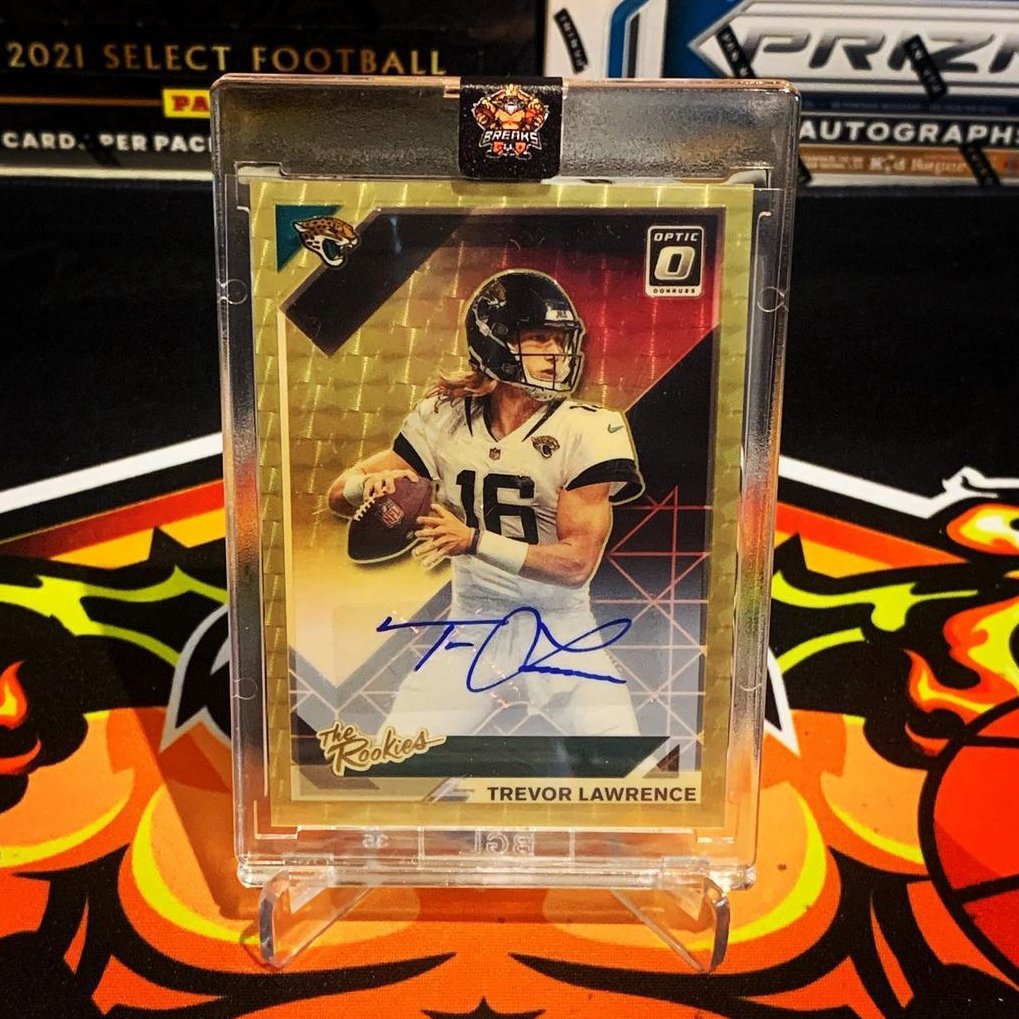 BreaksofGod's tweet photo. BoG strikes GOLD again! 🥇🔥
Adding on to the Gold Vinyl RPA 💽 from earlier this year, Donruss Optic revealed ANOTHER 1 of 1 @Trevorlawrencee 🐯🏈! This one is a BEAUTIFUL Gold Vinyl The Rookies Auto! 🔥📈 #PulledByBoG #TheHobby https://t.co/jusvnyROLc