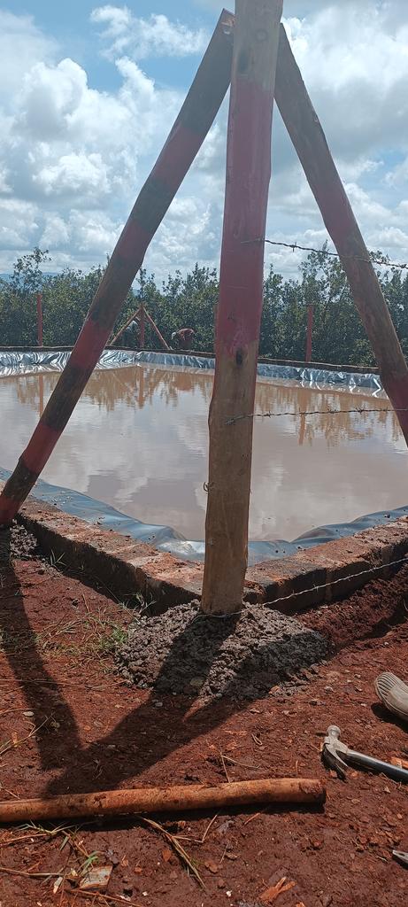 The water harvesting ponds are full. It's time to secure them with a fence. Making water reserves is a sure way of enabling food production even in times of drought. #ClimateAction #resilience #Adaptation