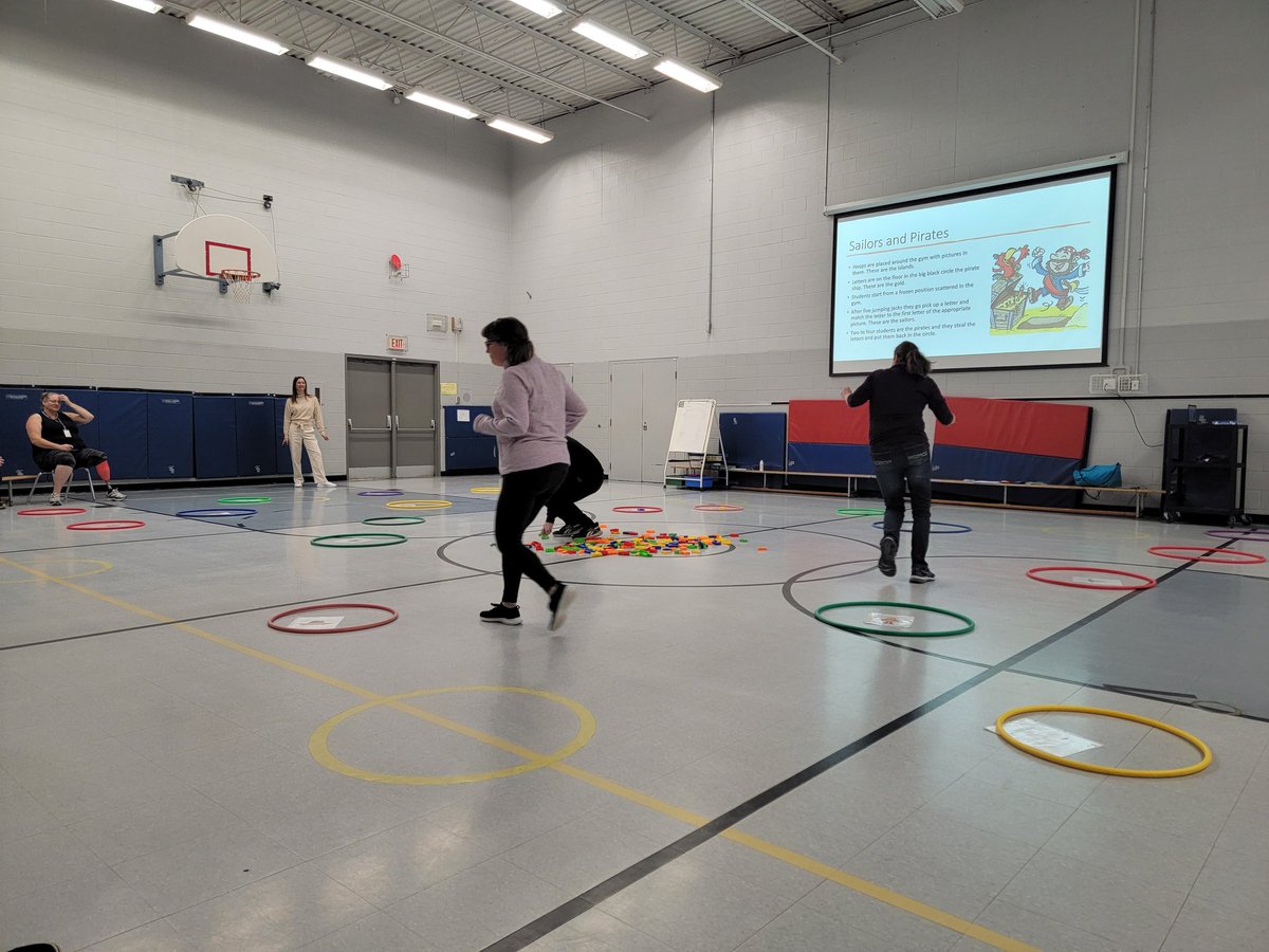 Teachers playing sailors and pirates - a literacy based warm up game for gym! Grab a letter, find it's matching picture, but beware, that sneaky pirate will steal all your hard work! <a href="/JMacElementary/">James MacDonald</a> <a href="/HWDSB/">HWDSB</a> #scienceofreading #physicaleducation