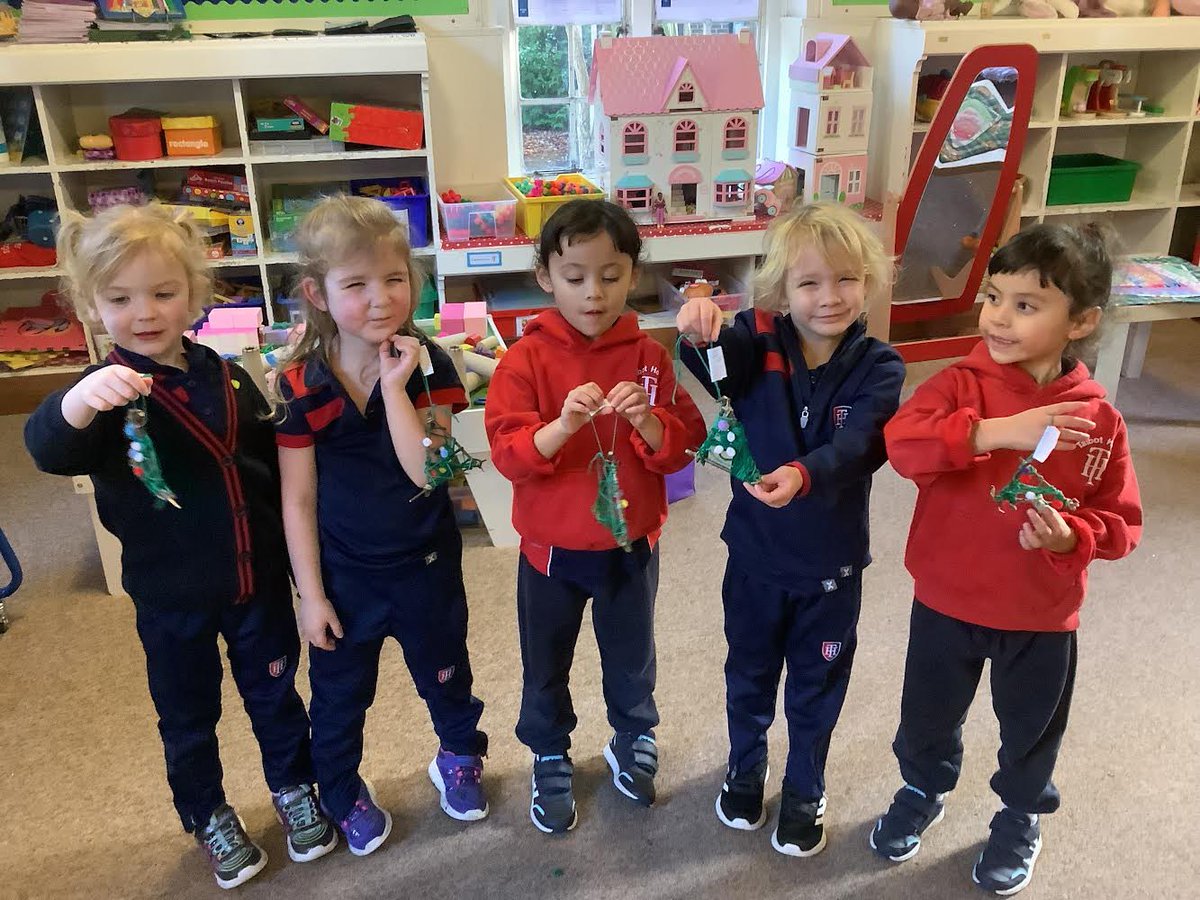 Reception used their fine motor skills to weave Christmas tree decorations made from hazel sticks and wool. They decorated their trees by gluing on pom-poms.<a href="/TalbotHeathSch/">Talbot Heath School</a> <a href="/THSch_Junior/">TH Junior School</a>
