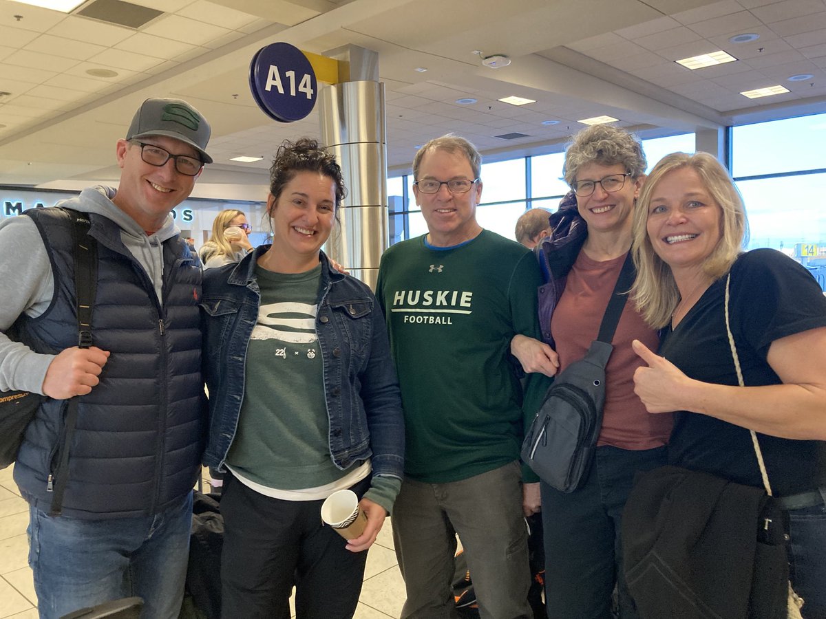 chamelin's tweet photo. Vanier Cup bound! Go Huskies. A great group of parents and our Chancellor Grit McCreath and husband Scott McCreath at YYC enroute to London for the big game! #huskiepride #usask https://t.co/yku99NtDvf