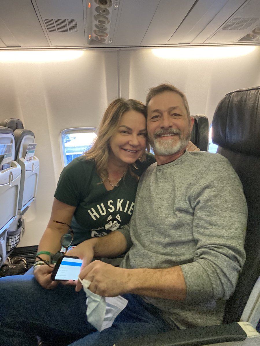 chamelin's tweet photo. Vanier Cup bound! Go Huskies. A great group of parents and our Chancellor Grit McCreath and husband Scott McCreath at YYC enroute to London for the big game! #huskiepride #usask https://t.co/yku99NtDvf