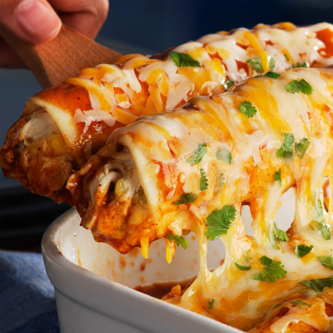 Sub in some Thanksgiving turkey in these Cheesy Chile Enchiladas and bring a little spice to your holiday leftovers. Link in bio.