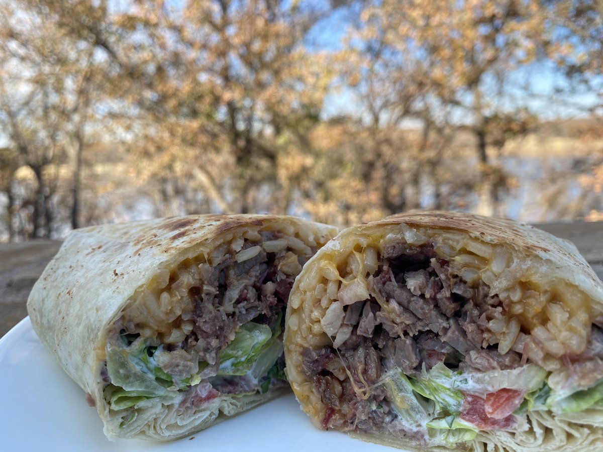 karstengrill's tweet photo. Special: smoked brisket burrito with cheese, lettuce, tomato, cilantro crema and Spanish rice. Choice of side $12 https://t.co/nlHyOSUFZF
