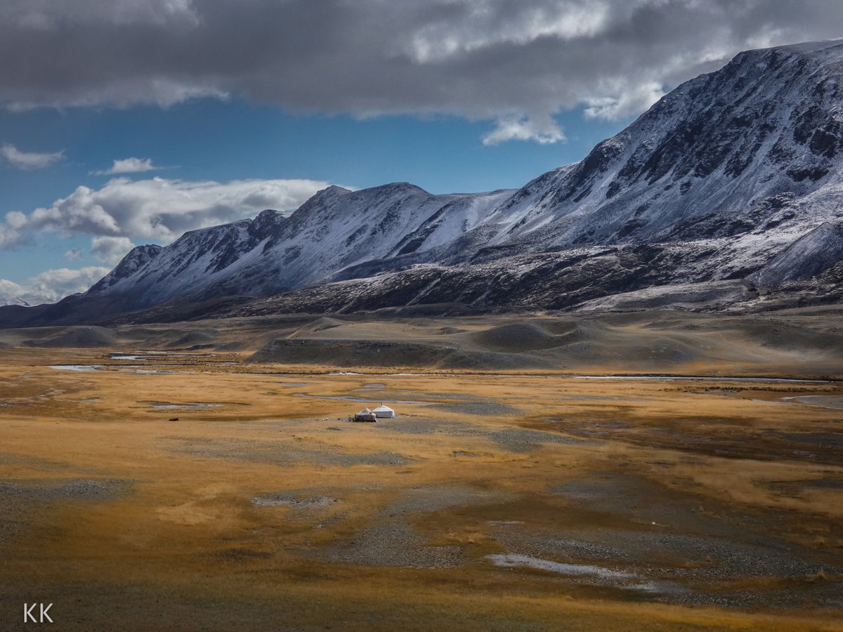 kevin2kelly's tweet photo. Think big, feel small. A solitary ger (yurt) inhabits a wide valley in western Mongolia. In a few weeks the family will move their home to lower altitudes to escape the snow.  Photo from my book https://t.co/ixLSqoxYsw #VanishingAsia #Mongolia https://t.co/WMpxdKAunl