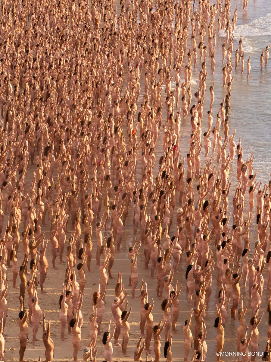 MorningBondi's tweet photo. Strip off for skin cancer. This morning from 4am onwards, more than 3500+ people took off their clothes to raise awareness of skin cancer and champion early detection. Amazing collab between @SkinCheckChamps & @SpencerTunick #stripoffforskincancer #bondi #bondibeach https://t.co/FYwyu0ZJJk